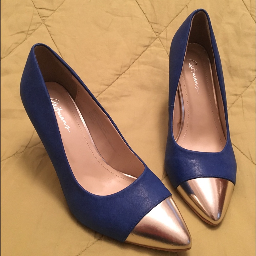 Blue high heel shoes with gold toe caps
